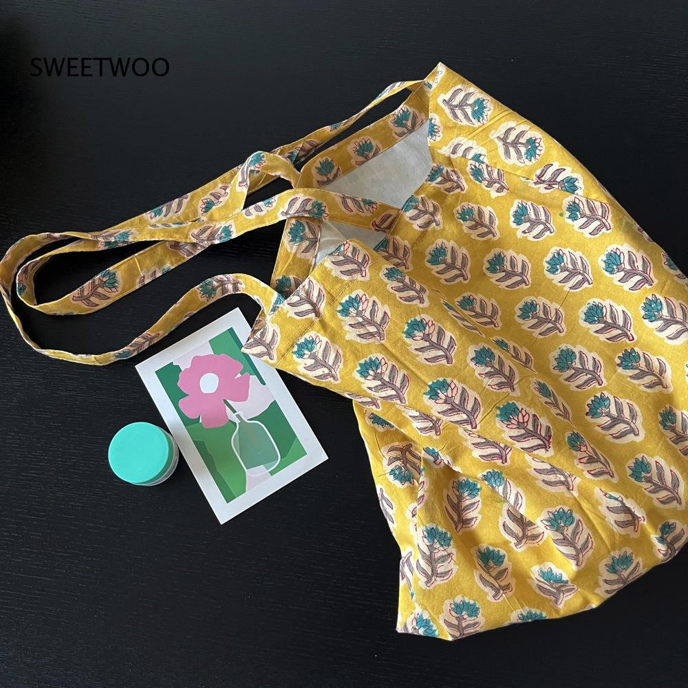 กระเป๋าผ้าทอเนื้อนุ่มลายพืชพรร - Women Bags India บทวิจารณ์และราคา