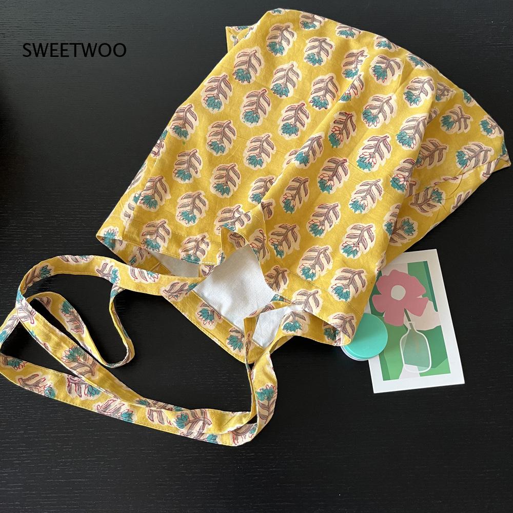 กระเป๋าผ้าทอเนื้อนุ่มลายพืชพรร - Women Bags India บทวิจารณ์และราคา